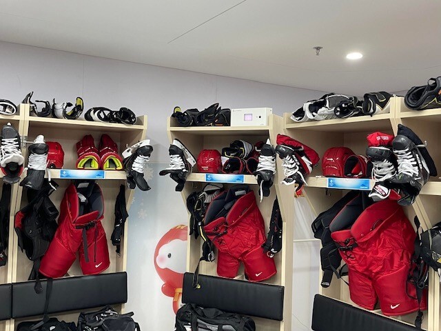 Team dressing room with gear, equipped with far-UVC
