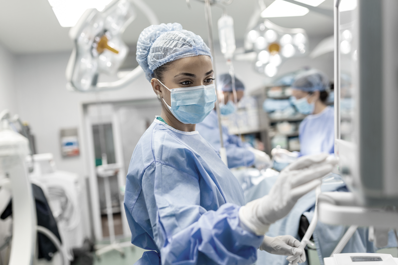Surgical team in a bright operating room